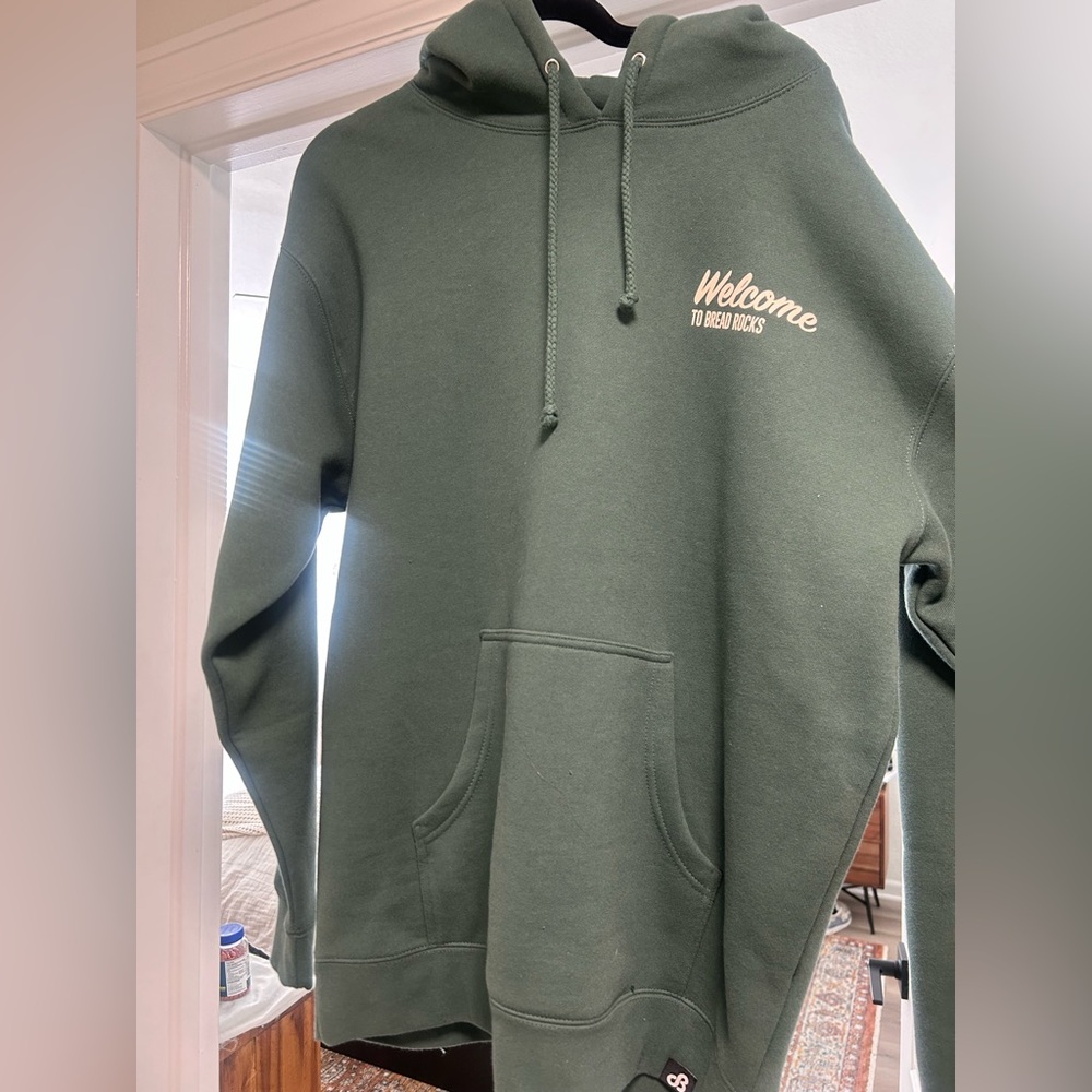 Daily Bread Green Hoodie - “Welcome to Bread Rocks” Red Rocks Design 2025